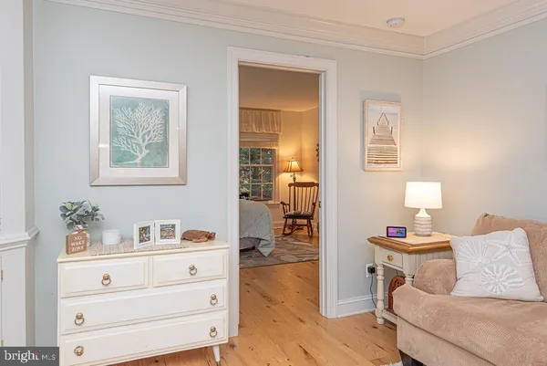 a dining room with furniture and a window