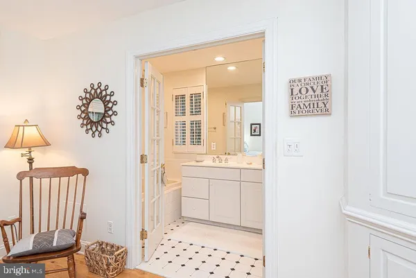 a spacious bathroom with a sink a toilet and shower