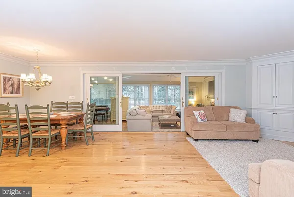 a kitchen with granite countertop a sink stove and refrigerator