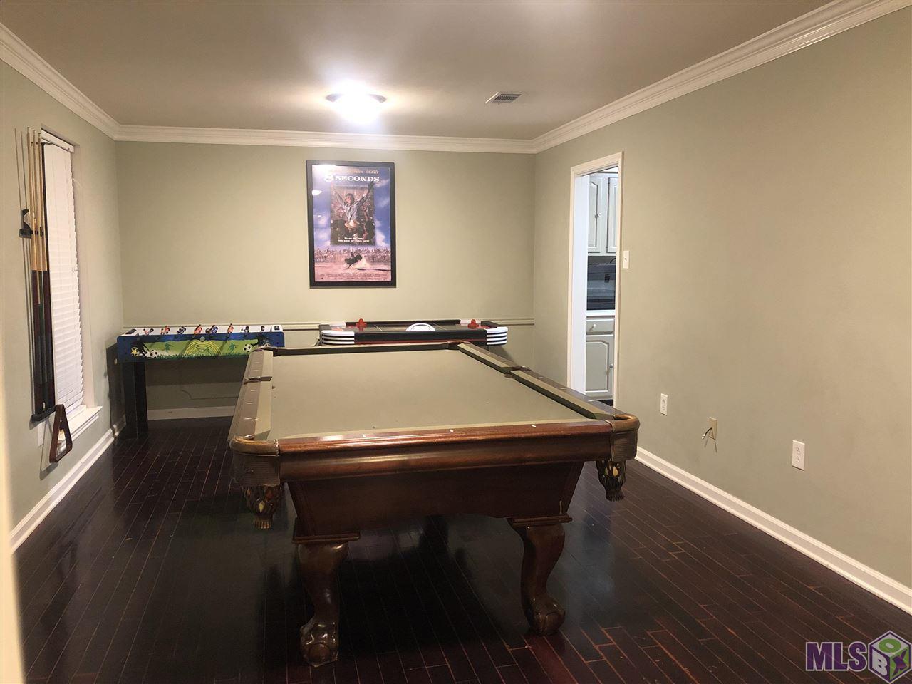 35094 Perkins Road Denham Springs, LA 70706 - Photo 4 of 16 Game Room/Dining Room