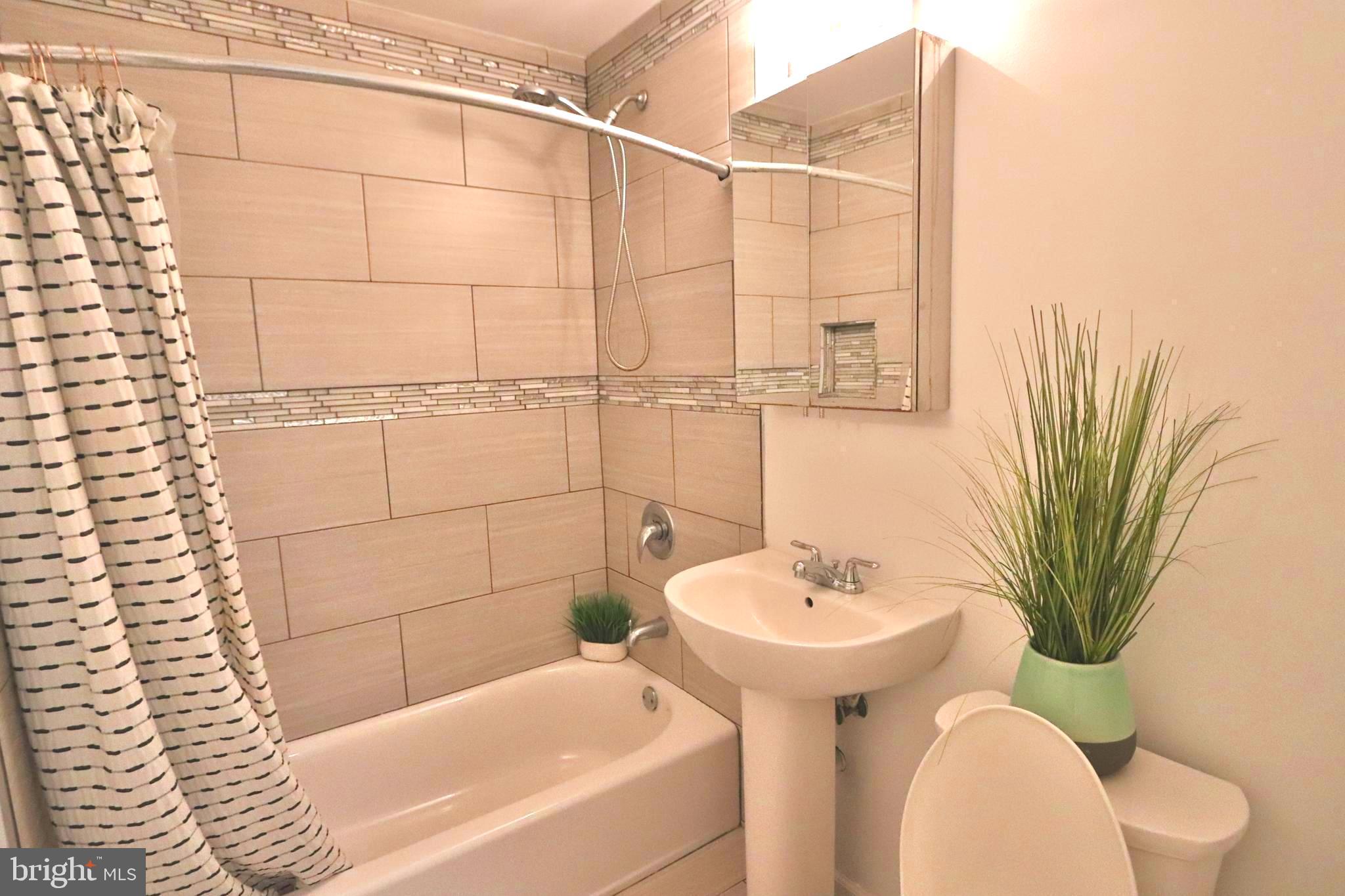 3125 Comly Road Philadelphia, PA 19154 - Photo 11 of 44 a bathroom with a sink toilet and shower