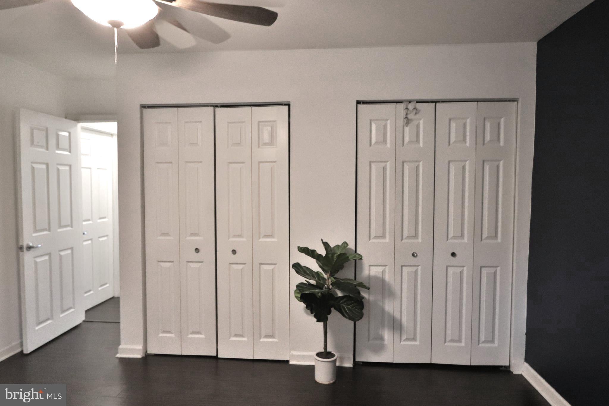 3125 Comly Road Philadelphia, PA 19154 - Photo 16 of 44 wooden floor with windows and ceiling fan