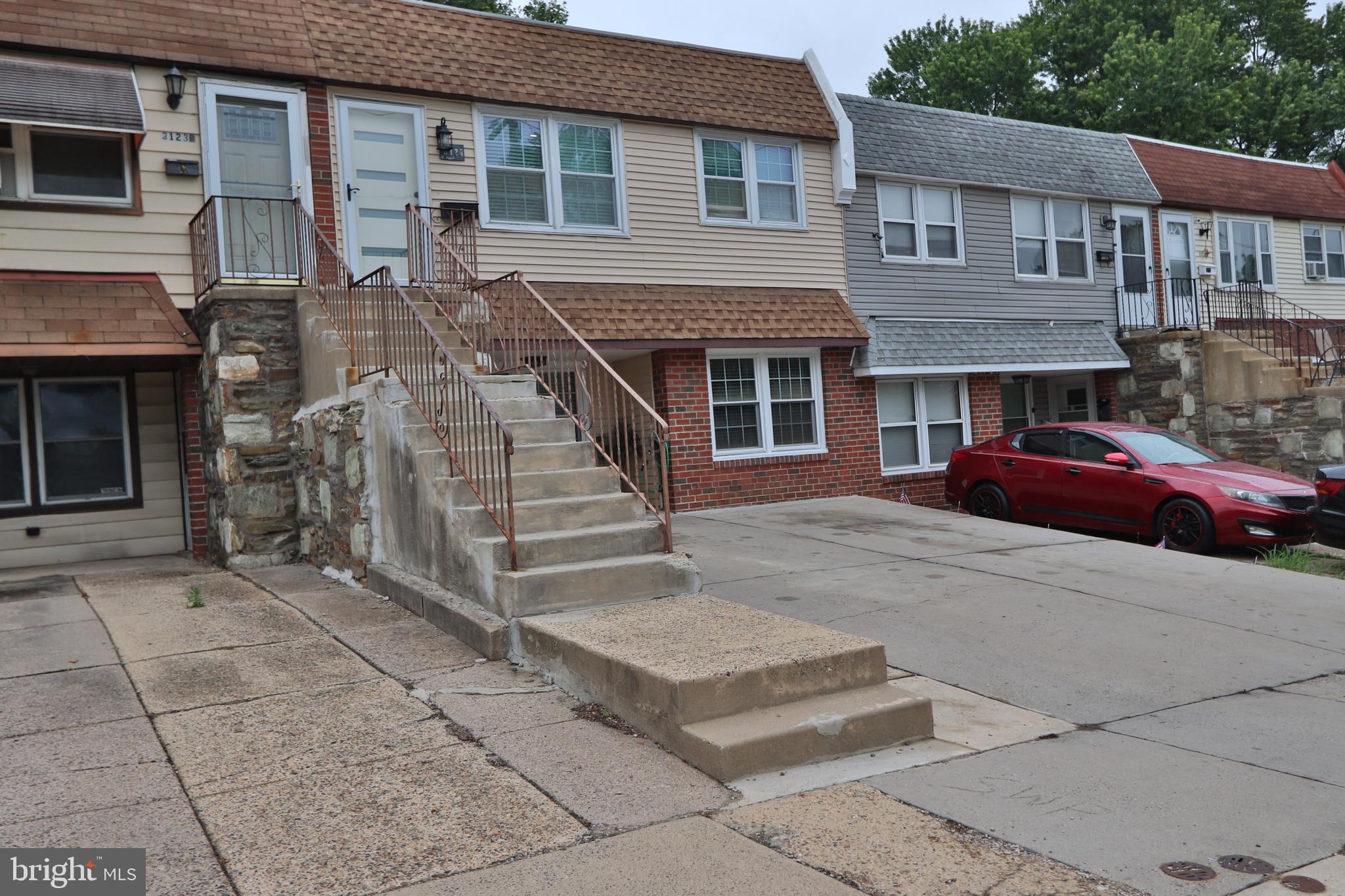 3125 Comly Road Philadelphia, PA 19154 - Photo 21 of 44 a front view of a house with a garden