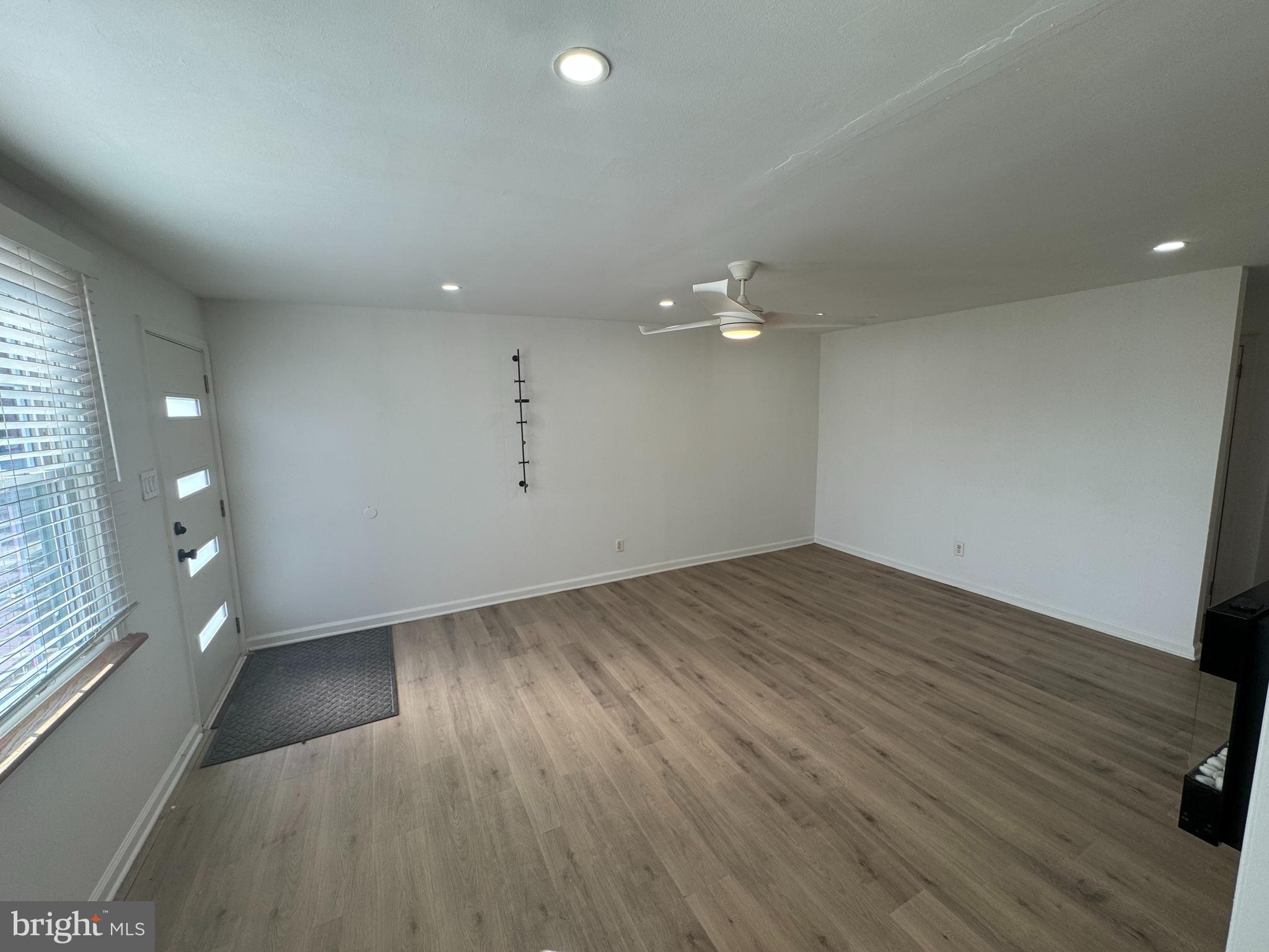3125 Comly Road Philadelphia, PA 19154 - Photo 22 of 44 an empty room with wooden floor and windows