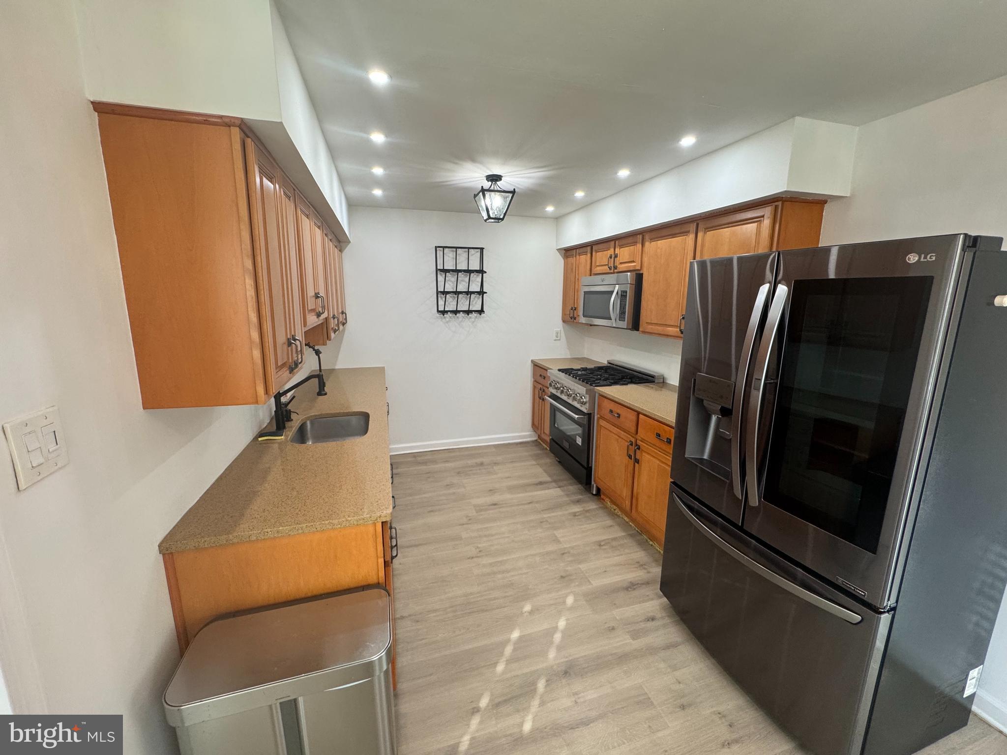 3125 Comly Road Philadelphia, PA 19154 - Photo 25 of 44 a kitchen with stainless steel appliances granite countertop a refrigerator and a sink