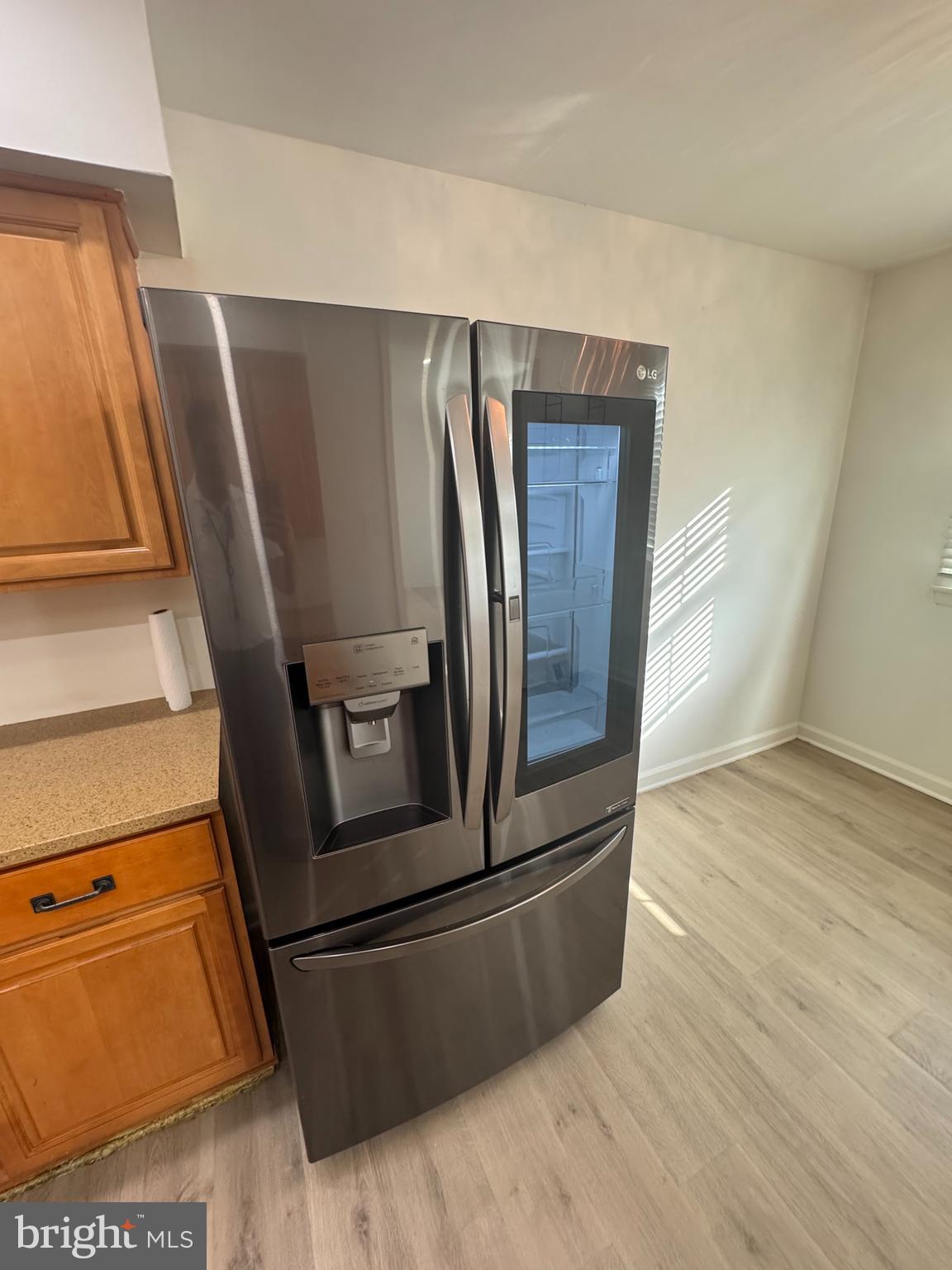 3125 Comly Road Philadelphia, PA 19154 - Photo 29 of 44 a view of a kitchen with wooden floor and stainless steel appliances