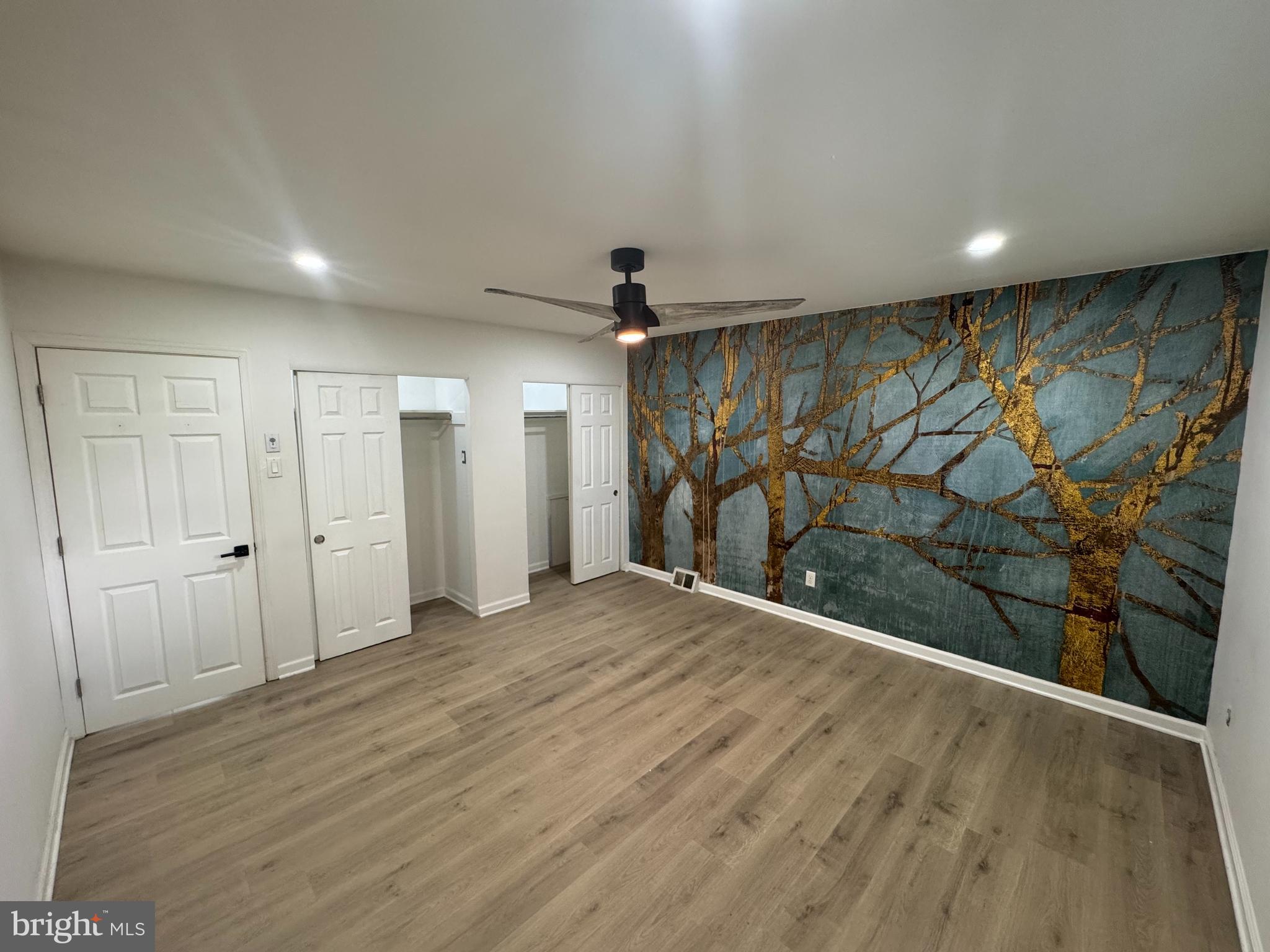 3125 Comly Road Philadelphia, PA 19154 - Photo 31 of 44 an empty room with wooden floor and a ceiling fan