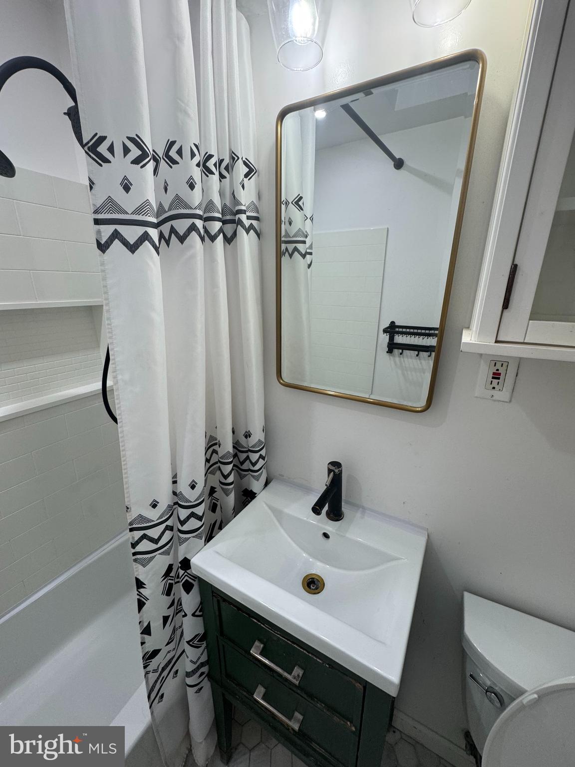 3125 Comly Road Philadelphia, PA 19154 - Photo 32 of 44 a bathroom with a sink a toilet and shower