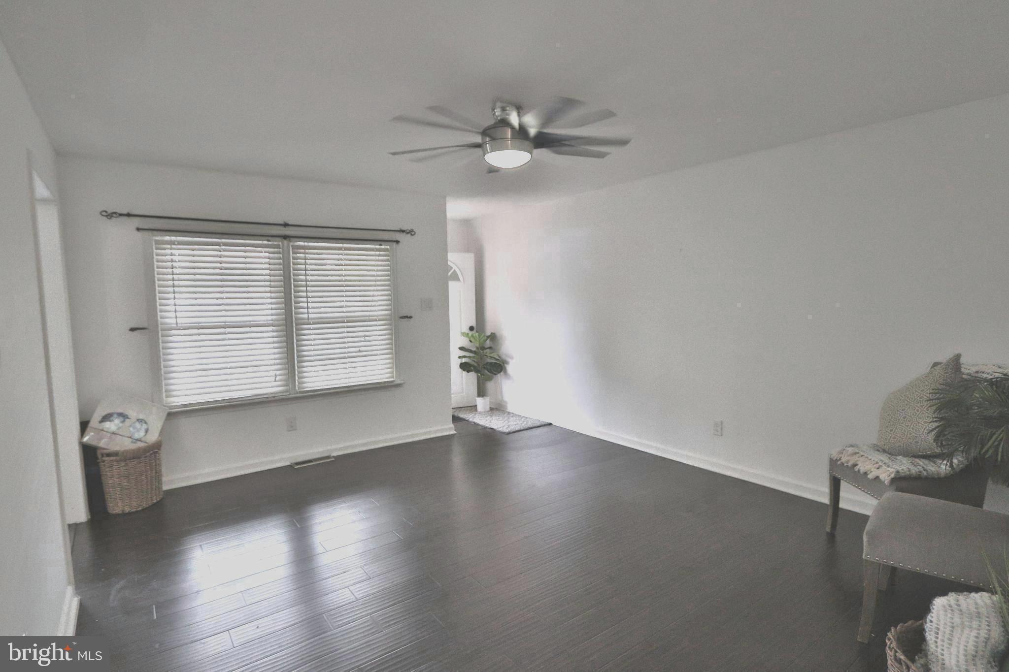 3125 Comly Road Philadelphia, PA 19154 - Photo 4 of 44 wooden floor in an empty room with a window