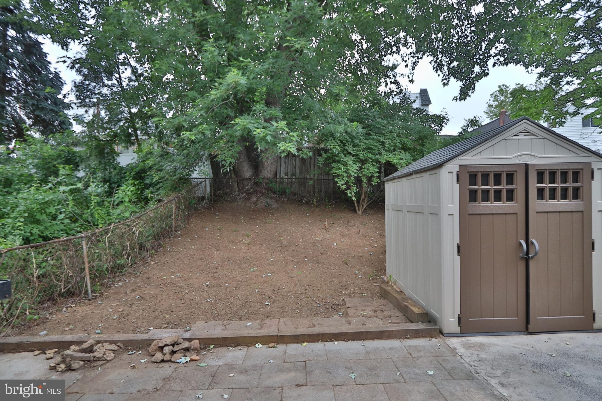 3125 Comly Road Philadelphia, PA 19154 - Photo 41 of 44 a view of a grey house with large trees