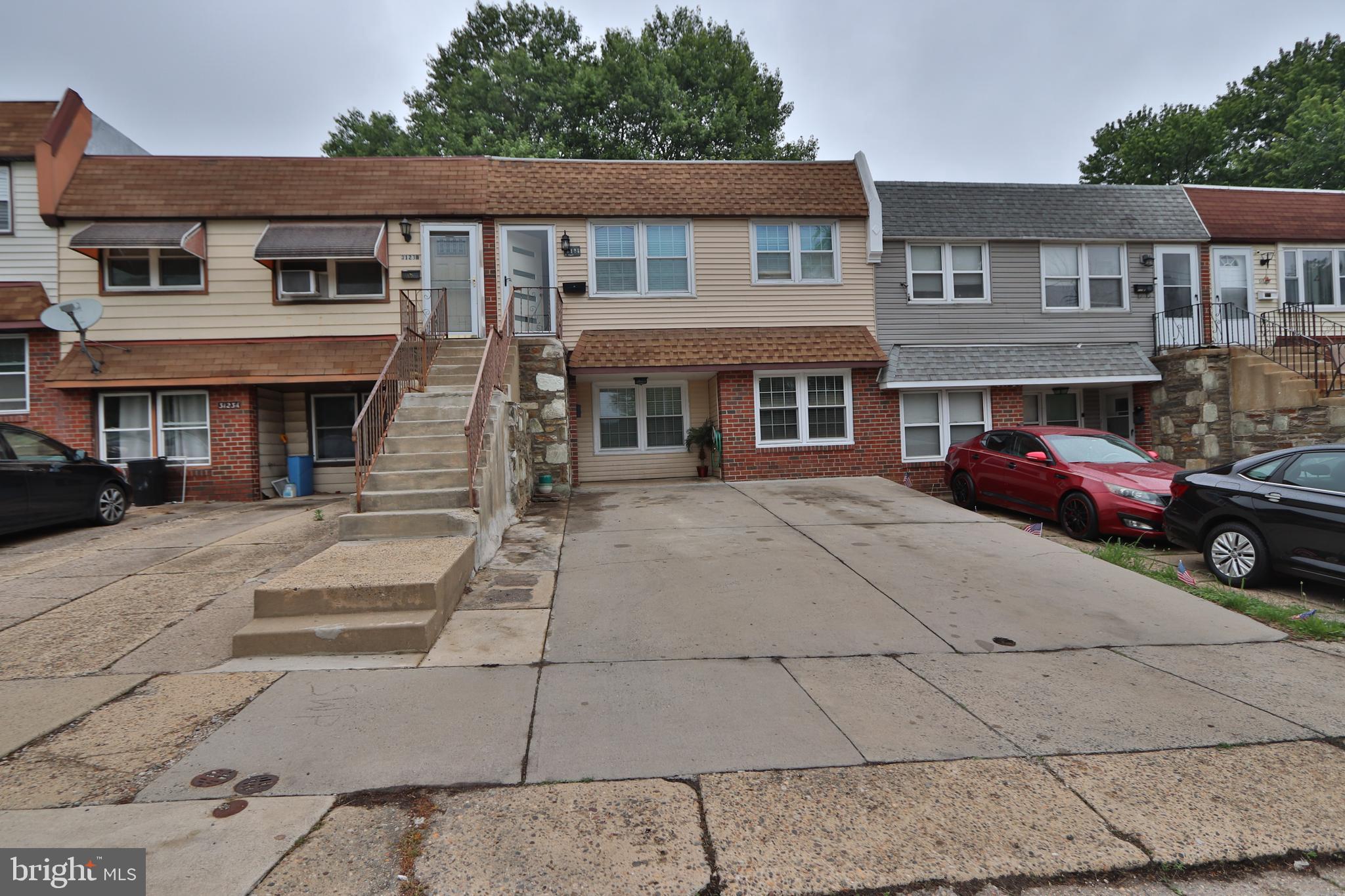 3125 Comly Road Philadelphia, PA 19154 - Photo 43 of 44 a front view of a house with a yard
