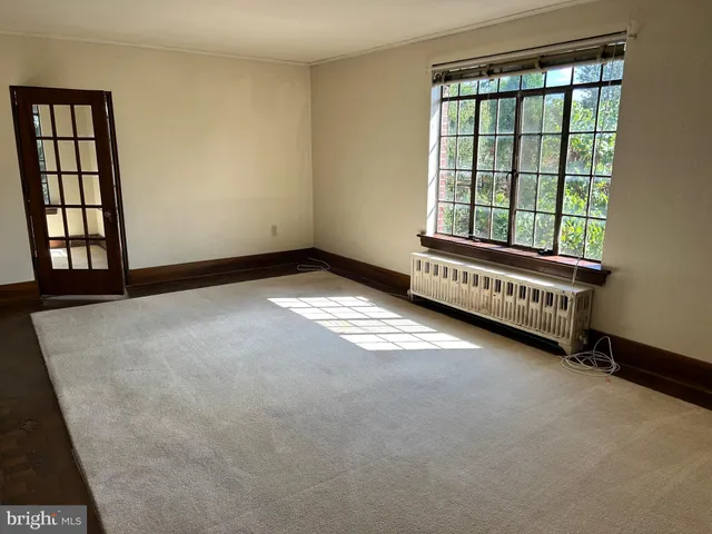 an empty room with windows