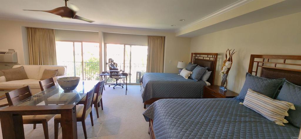 2005 Costa Del Mar Road, Unit 619 Carlsbad, CA 92009 - Photo 17 of 23 a bedroom with furniture and wooden floor