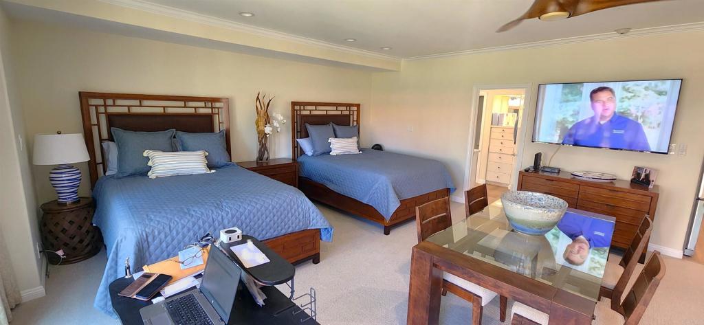 2005 Costa Del Mar Road, Unit 619 Carlsbad, CA 92009 - Photo 18 of 23 a bedroom with two beds and painted walls
