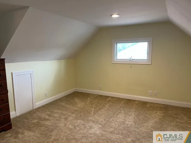 an empty room with a hallway