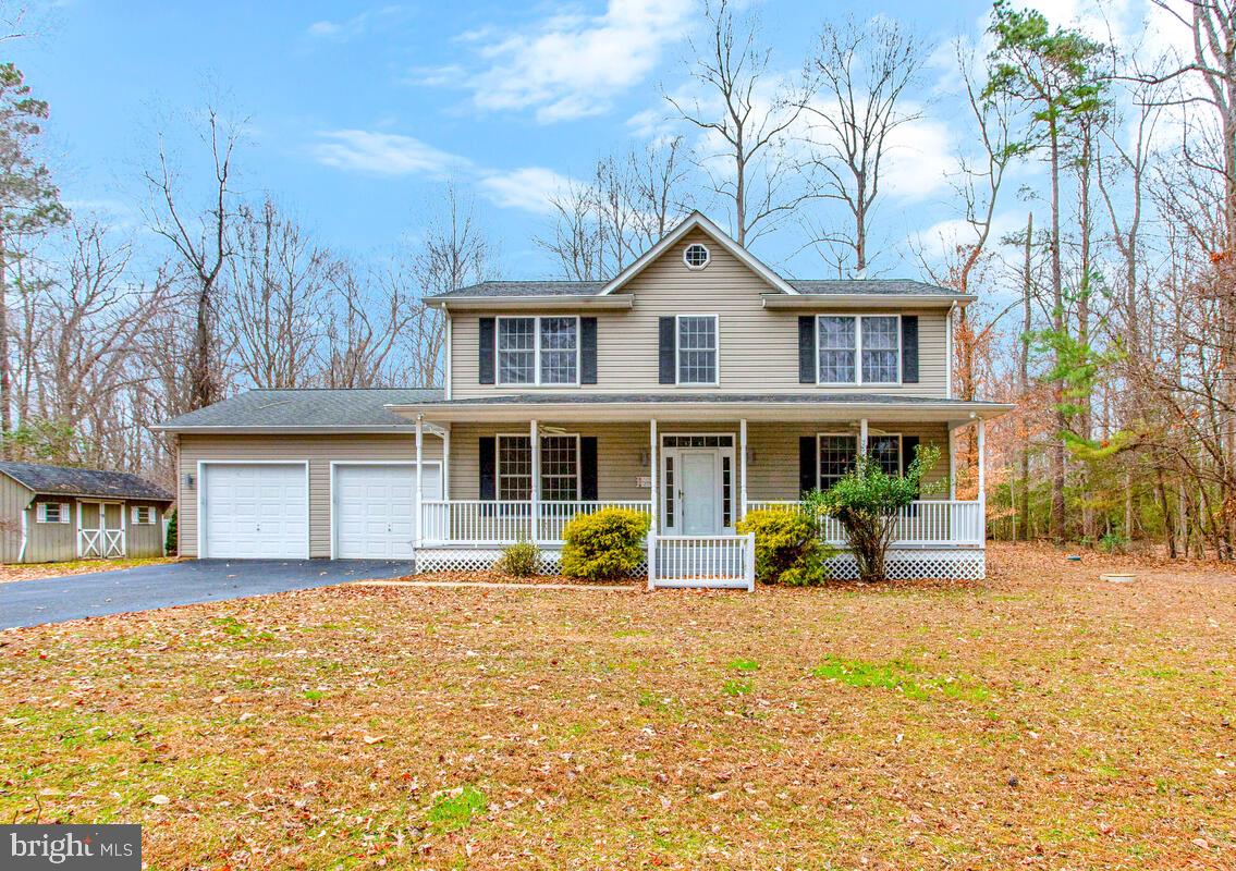 a front view of a house with patio