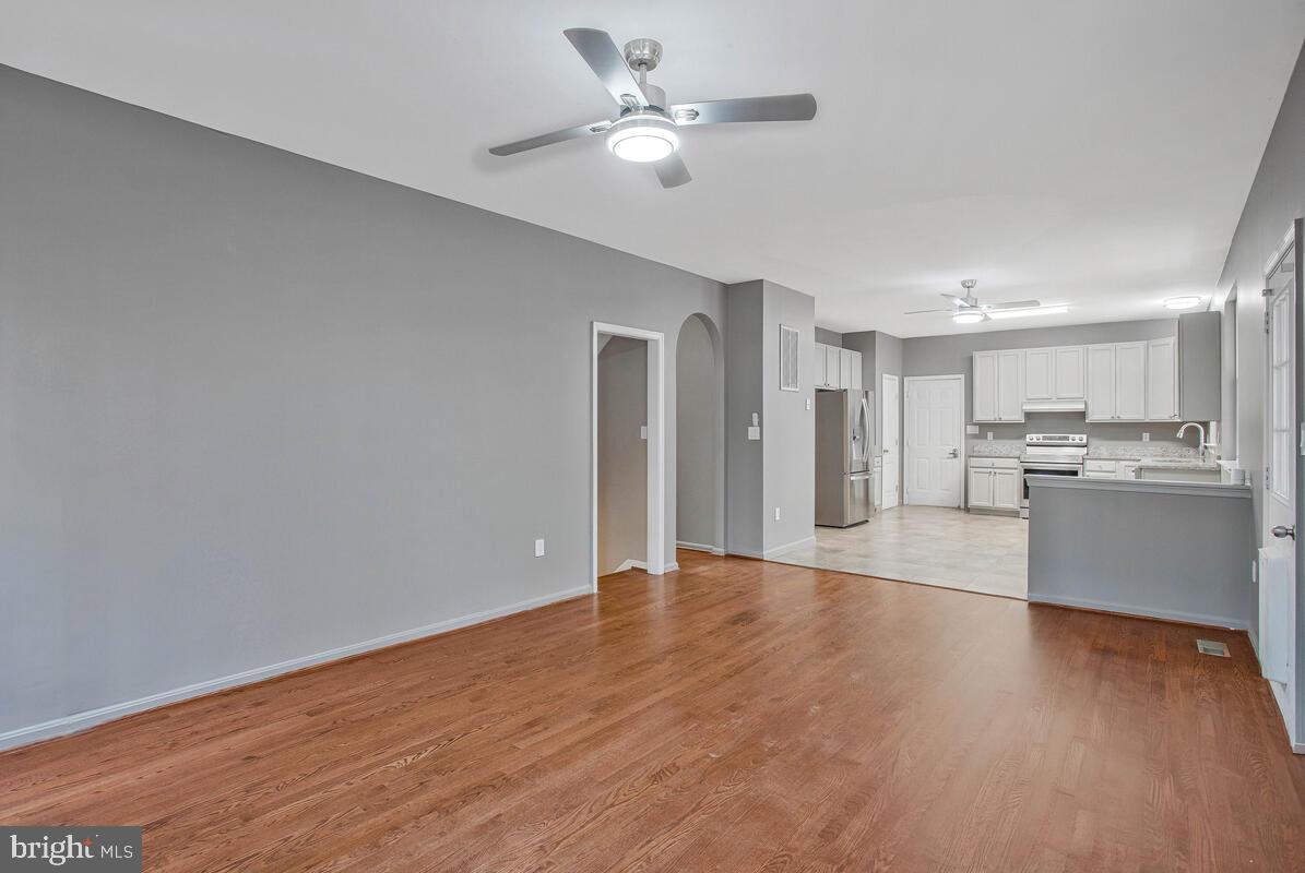 2775 Scientists Cliffs Road Port Republic, MD 20676 - Photo 13 of 54 a view of a kitchen with a sink and a refrigerator