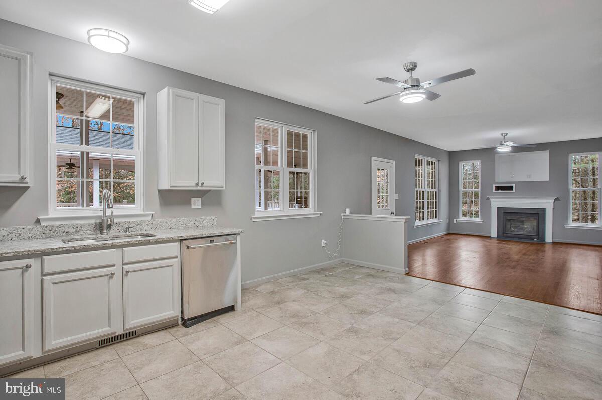 2775 Scientists Cliffs Road Port Republic, MD 20676 - Photo 18 of 54 a view of an empty room with a window and wooden floor