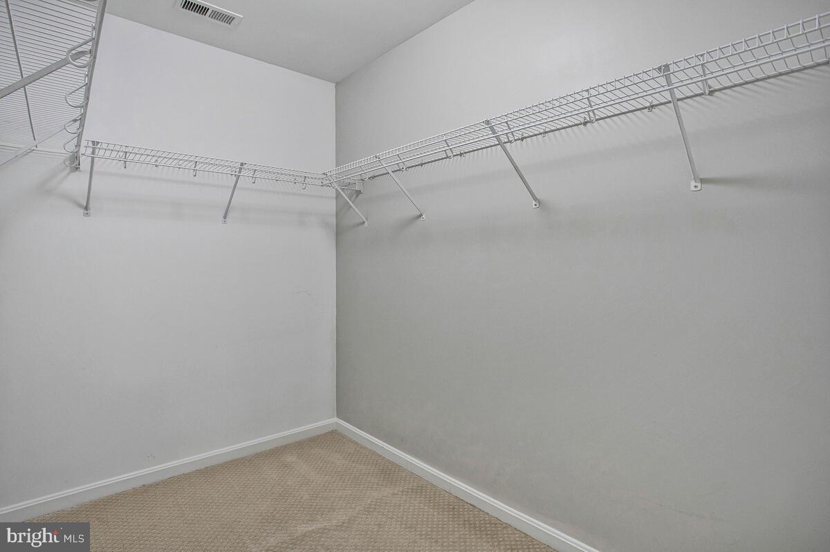 2775 Scientists Cliffs Road Port Republic, MD 20676 - Photo 26 of 54 a view of a room with racks on the wall