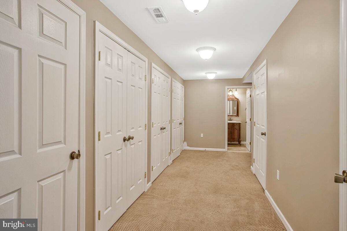 2775 Scientists Cliffs Road Port Republic, MD 20676 - Photo 35 of 54 a view of a hallway