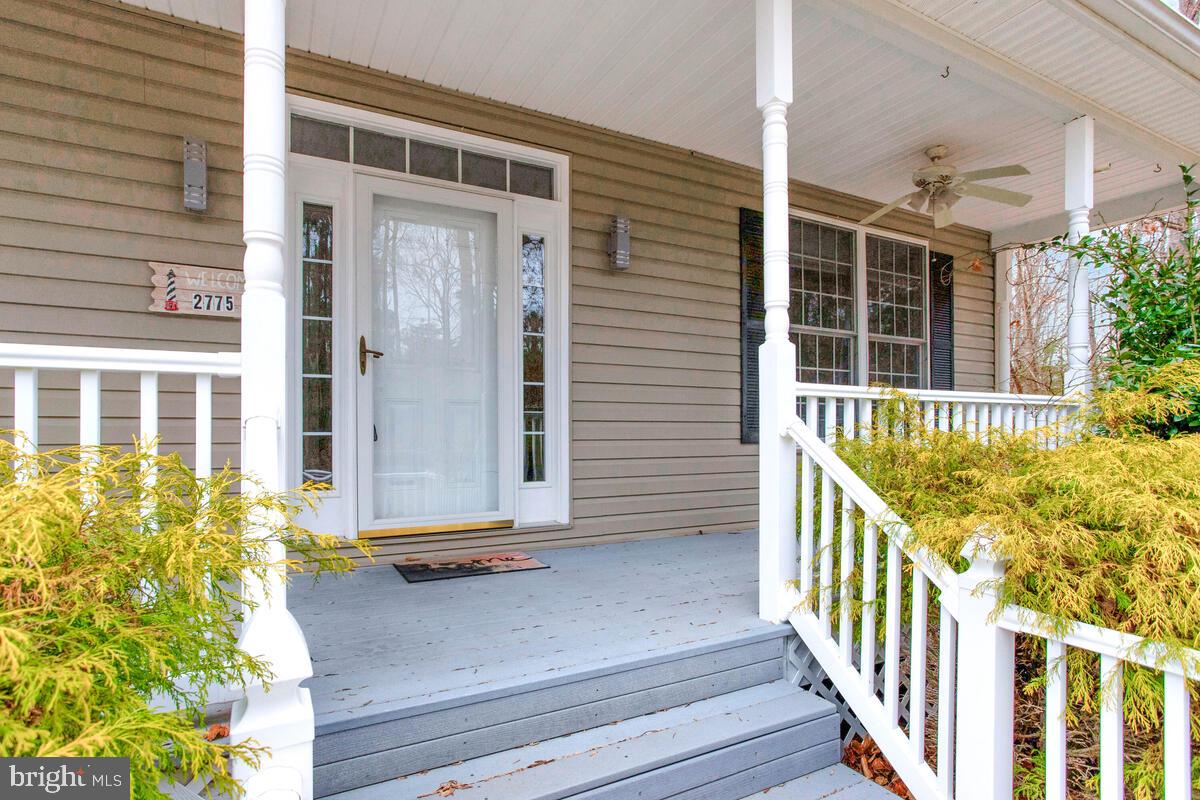 2775 Scientists Cliffs Road Port Republic, MD 20676 - Photo 4 of 54 a view of porch with a porch