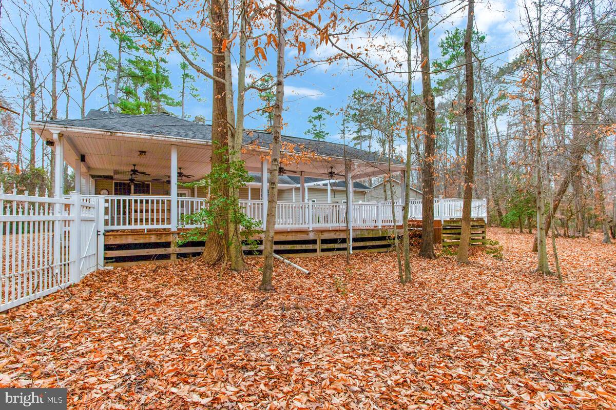 2775 Scientists Cliffs Road Port Republic, MD 20676 - Photo 44 of 54 a backyard of a house with lots of green space