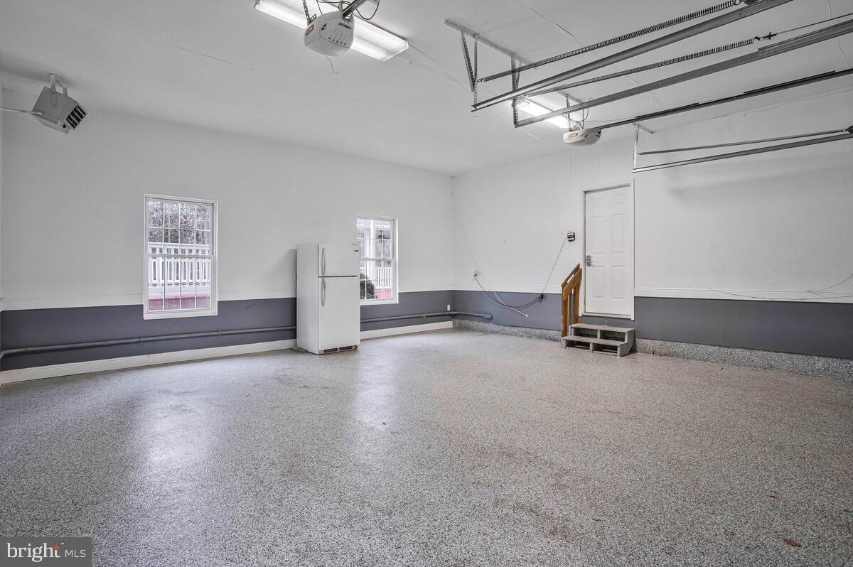 2775 Scientists Cliffs Road Port Republic, MD 20676 - Photo 48 of 54 an empty room with windows and ceiling fan