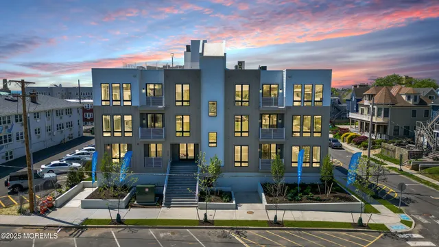 a front view of a building with street view