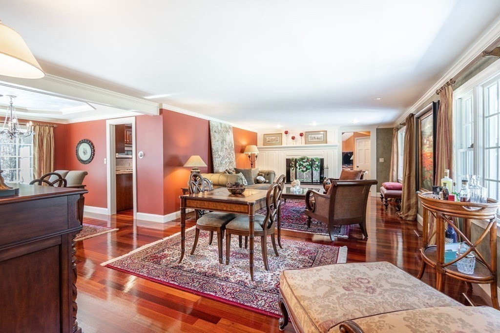 83 Valley Road Boxford, MA 01921 - Photo 15 of 31 a living room with furniture a rug and a large window