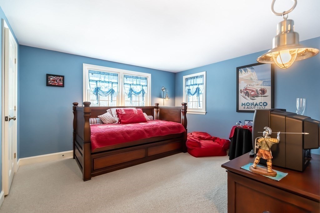 83 Valley Road Boxford, MA 01921 - Photo 23 of 31 a bedroom with furniture and a window