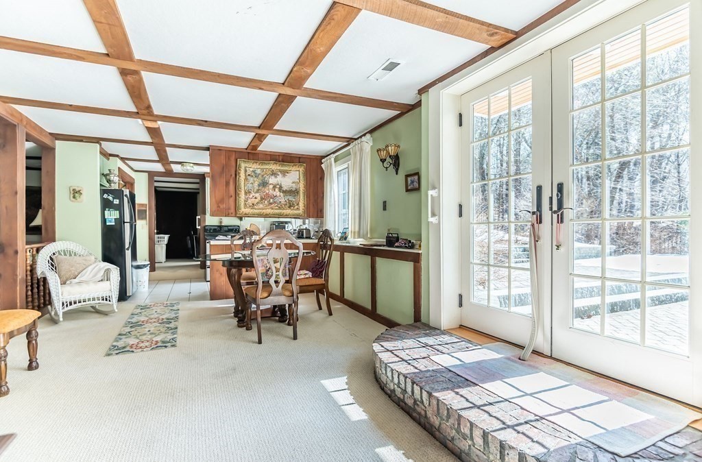 83 Valley Road Boxford, MA 01921 - Photo 27 of 31 a view of a livingroom with furniture and a window