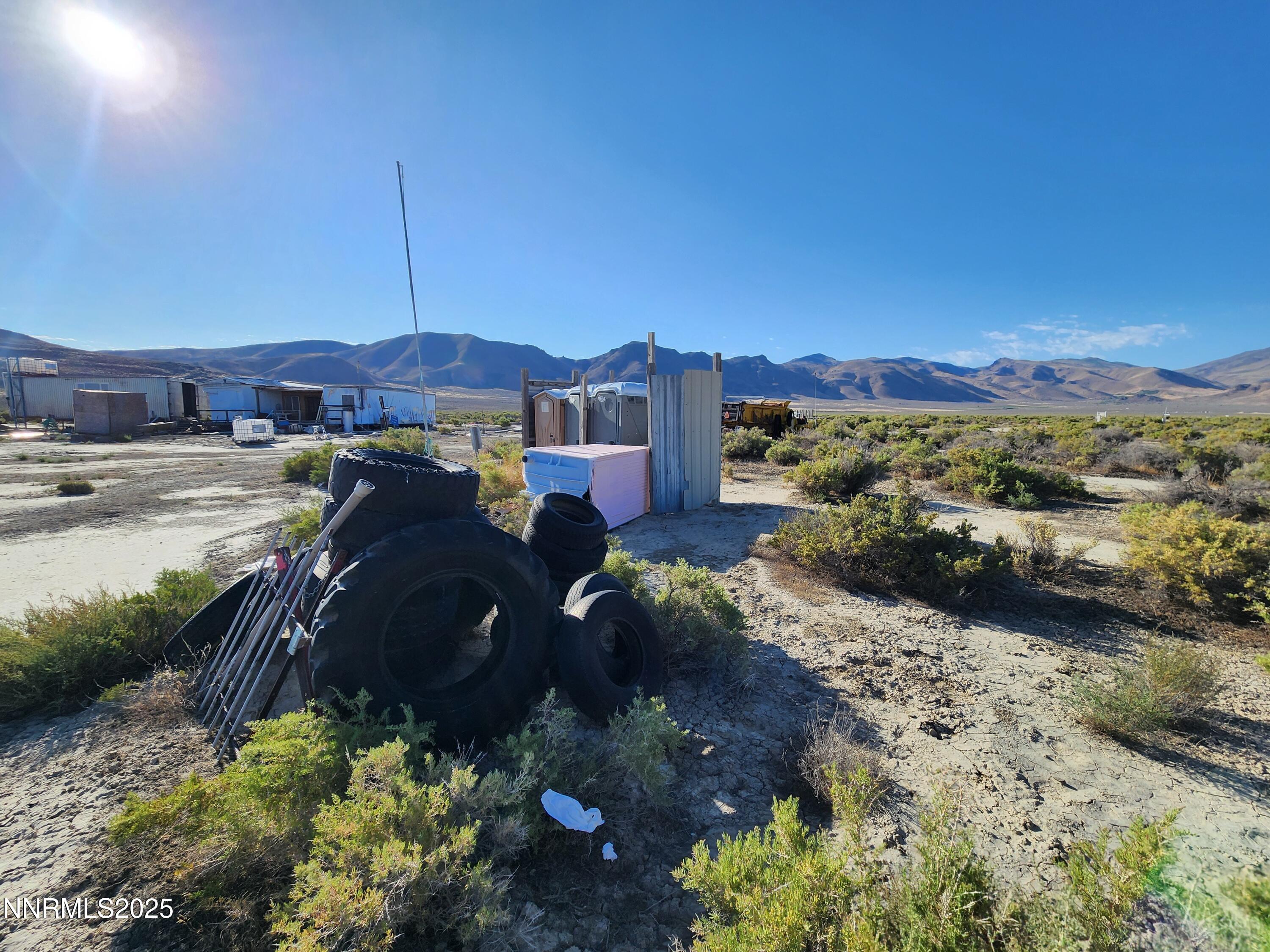 1385 Rancho Lane, Unit OUT IN HONEY LAKE BASIN ON NV SIDE Reno, NV 89510 - Photo 11 of 47 a view of a lake with a mountain in the background