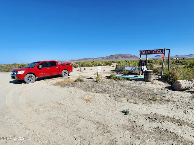 a view of a mountain range with trees