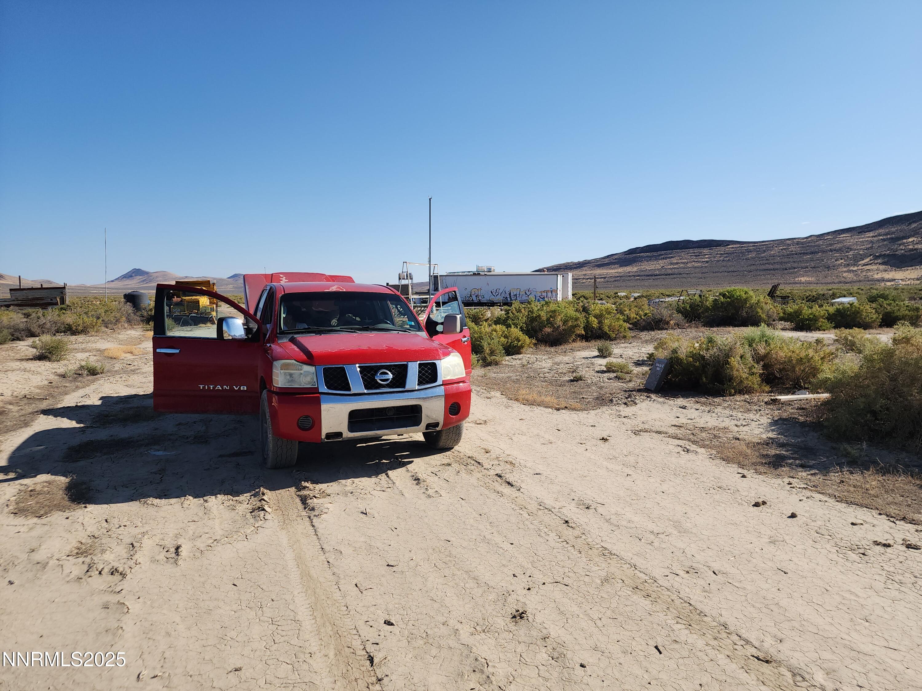 1385 Rancho Lane, Unit OUT IN HONEY LAKE BASIN ON NV SIDE Reno, NV 89510 - Photo 39 of 47 a car parked on the side of a road