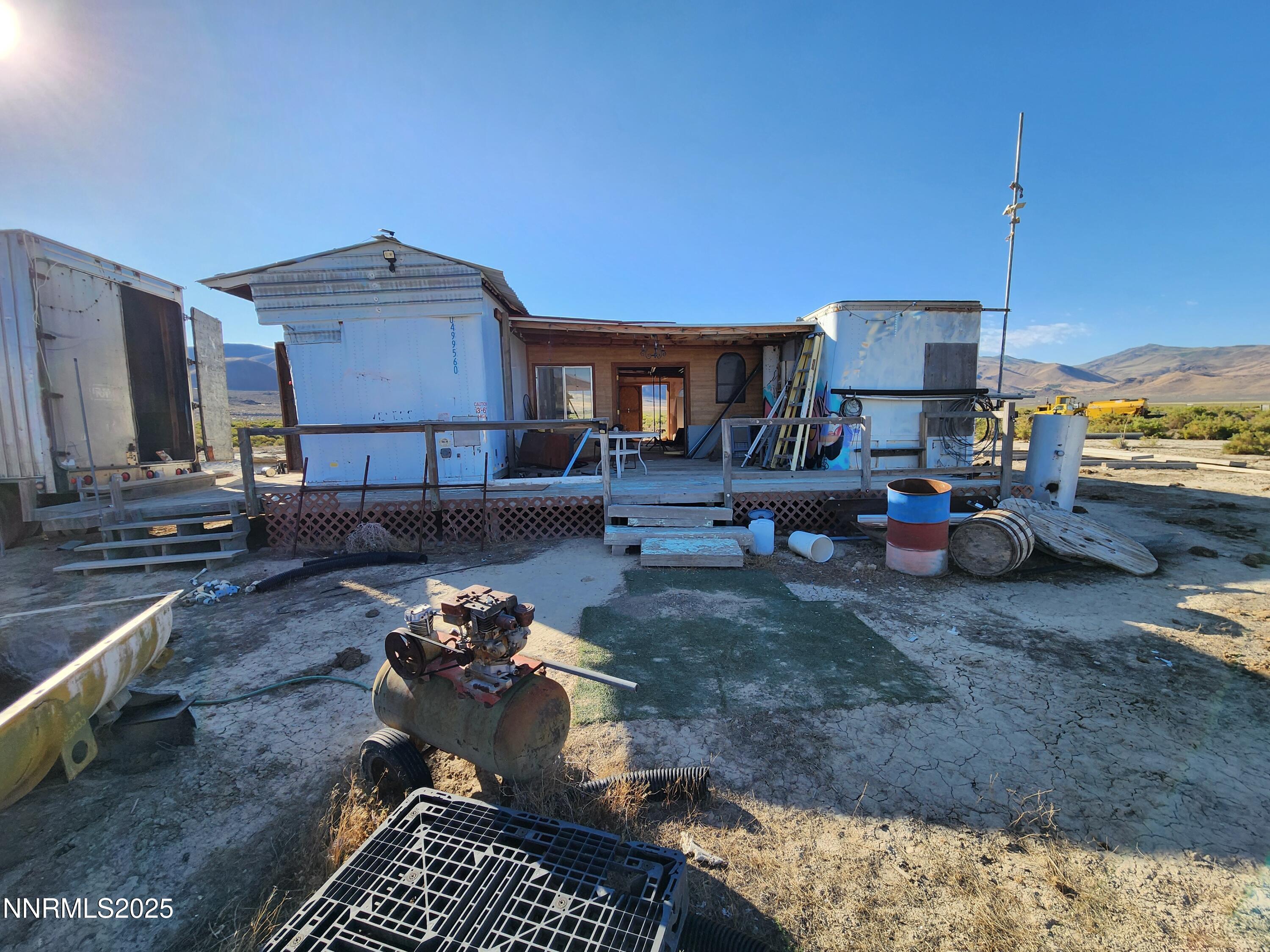1385 Rancho Lane, Unit OUT IN HONEY LAKE BASIN ON NV SIDE Reno, NV 89510 - Photo 4 of 47 a living room with furniture and a couch
