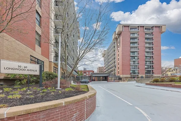 a view of street with large building