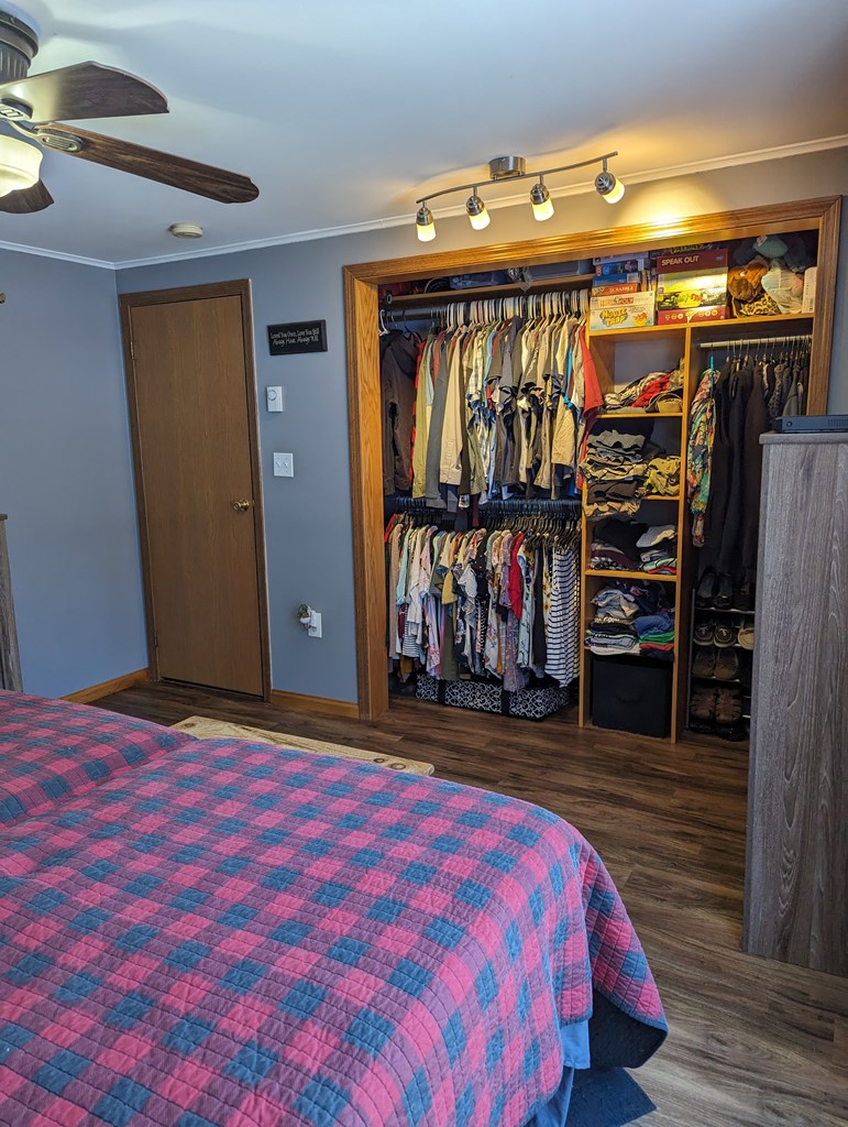1406 Valley Road Polk, PA 16342 - Photo 23 of 31 a bedroom with a bed and a closet