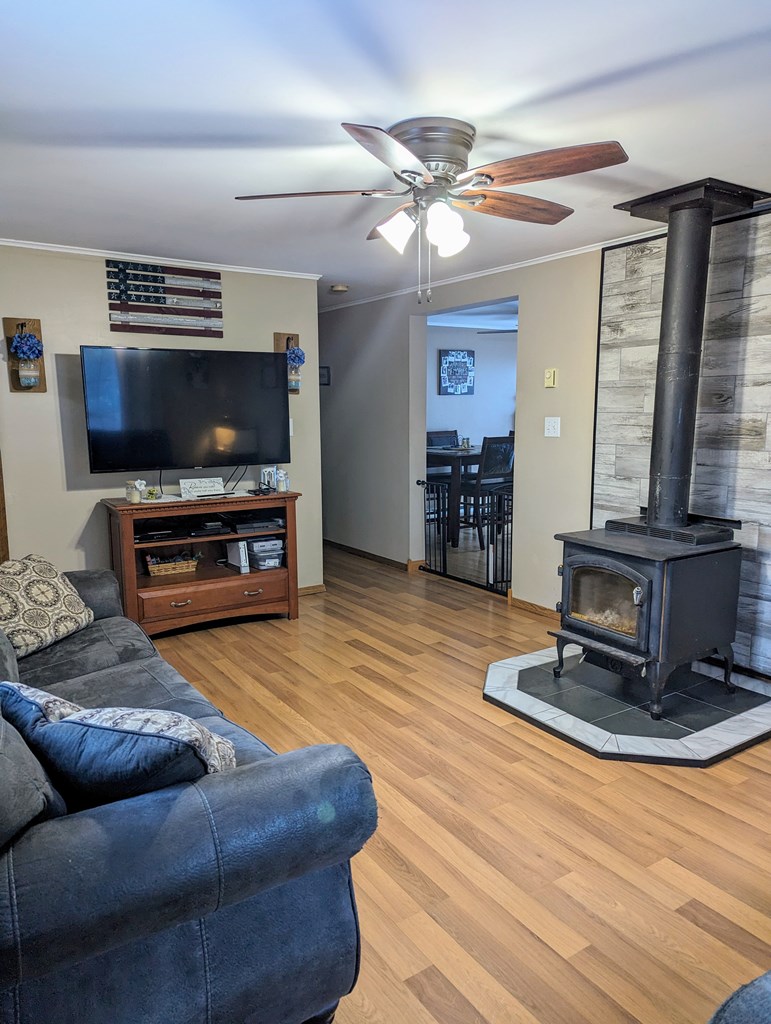 1406 Valley Road Polk, PA 16342 - Photo 10 of 31 a living room with furniture and a flat screen tv