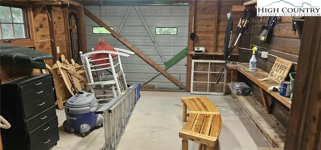 a view of balcony and with chairs
