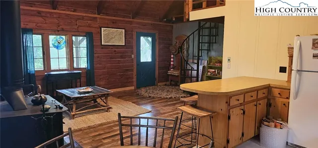 a view of a kitchen area with furniture