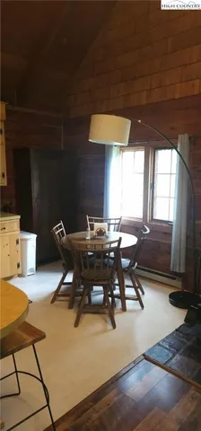 a view of a workspace with furniture