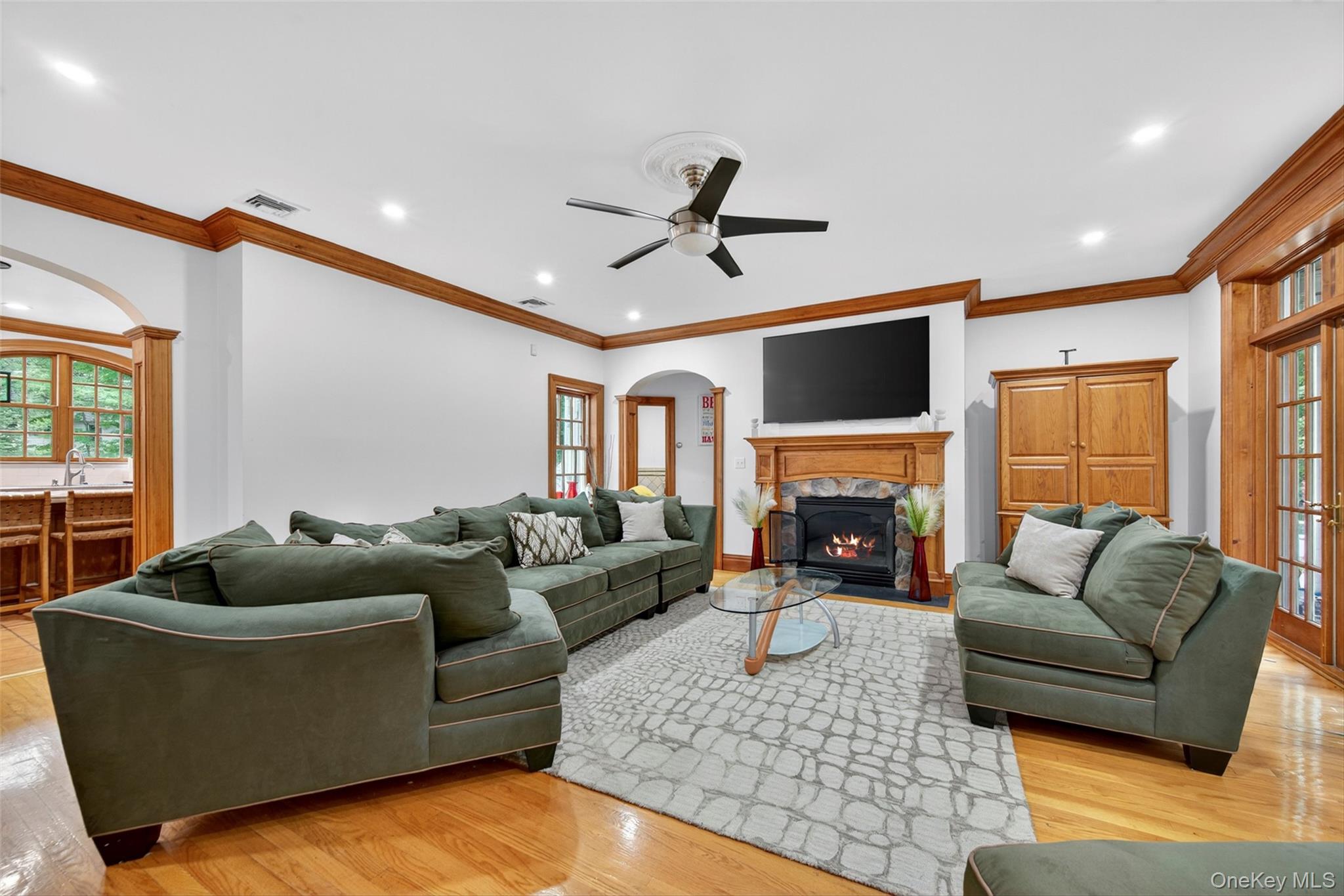 10 Greenwich Avenue Central Valley, NY 10917 - Photo 11 of 42 a living room with furniture a fireplace and a large window