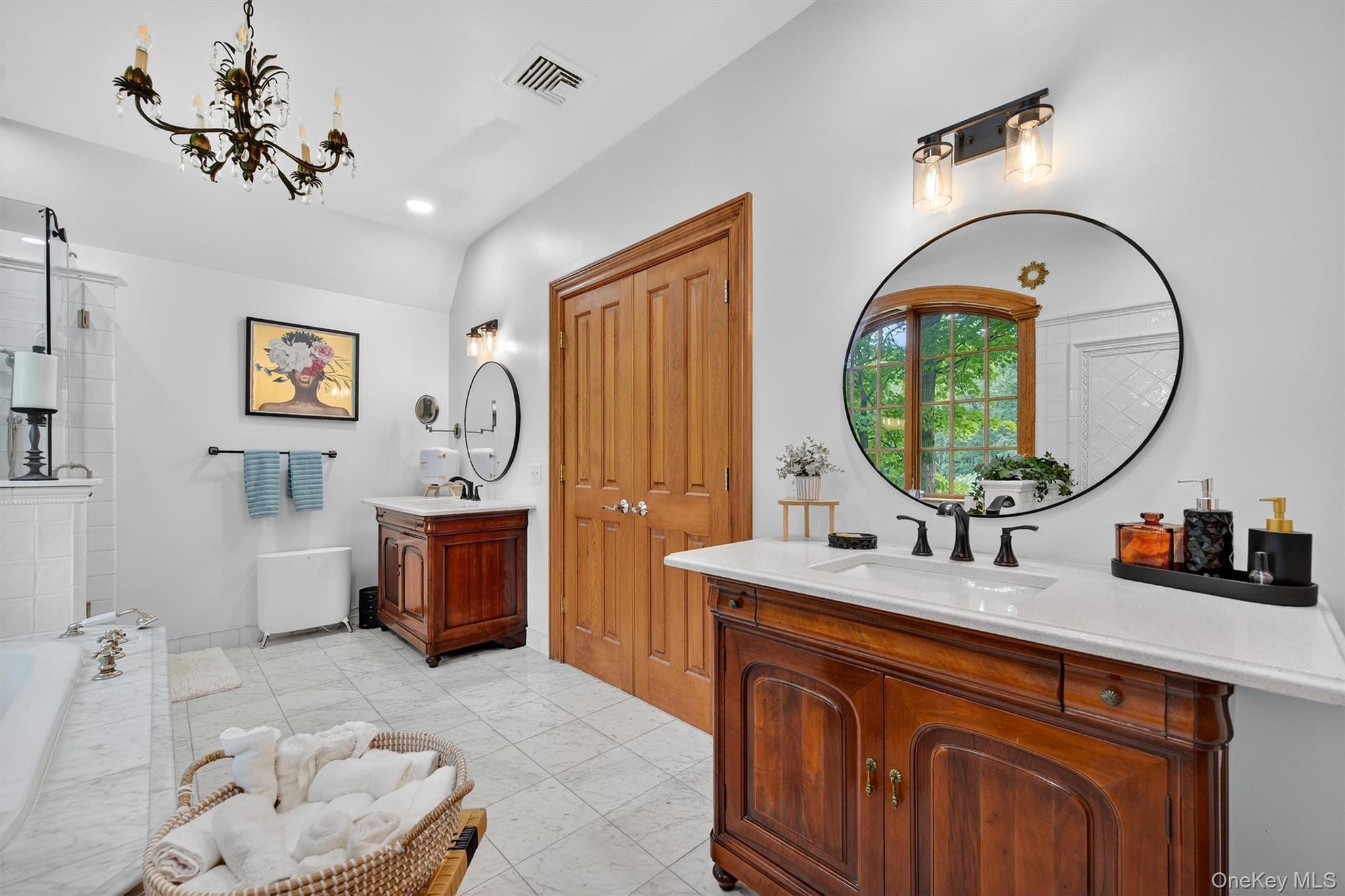 10 Greenwich Avenue Central Valley, NY 10917 - Photo 20 of 42 a bathroom with a sink a mirror and a bathtub