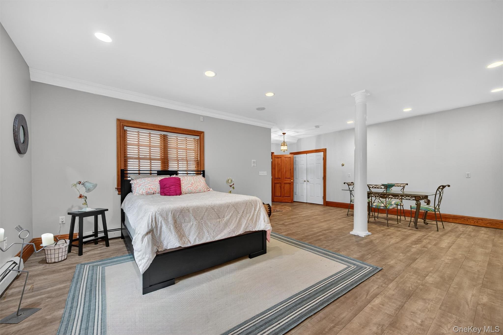 10 Greenwich Avenue Central Valley, NY 10917 - Photo 28 of 42 a bedroom with a bed and a table in it
