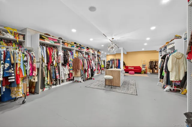 a view of a room with clothes and shoes