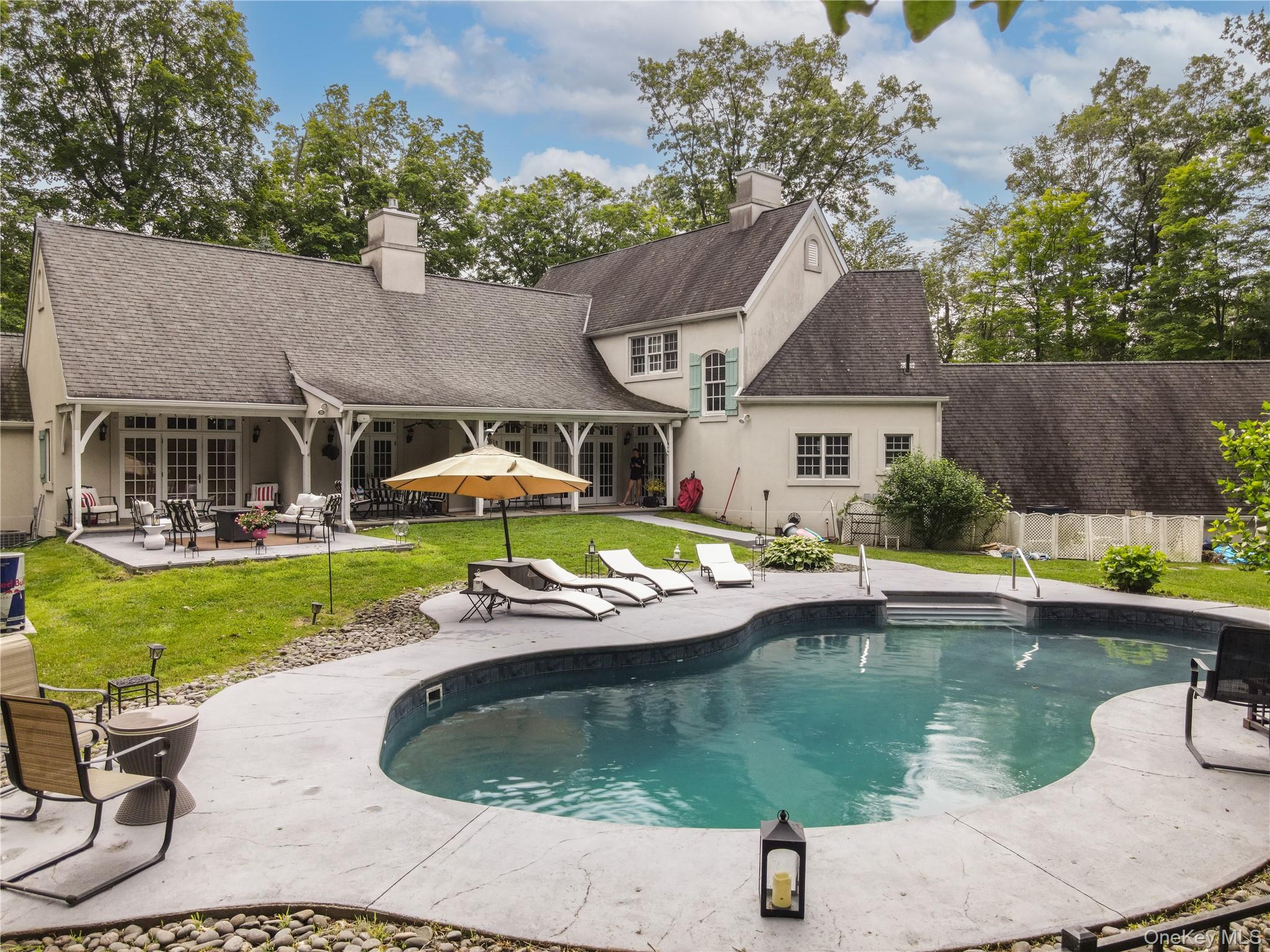 10 Greenwich Avenue Central Valley, NY 10917 - Photo 34 of 42 an aerial view of a house with swimming pool and patio