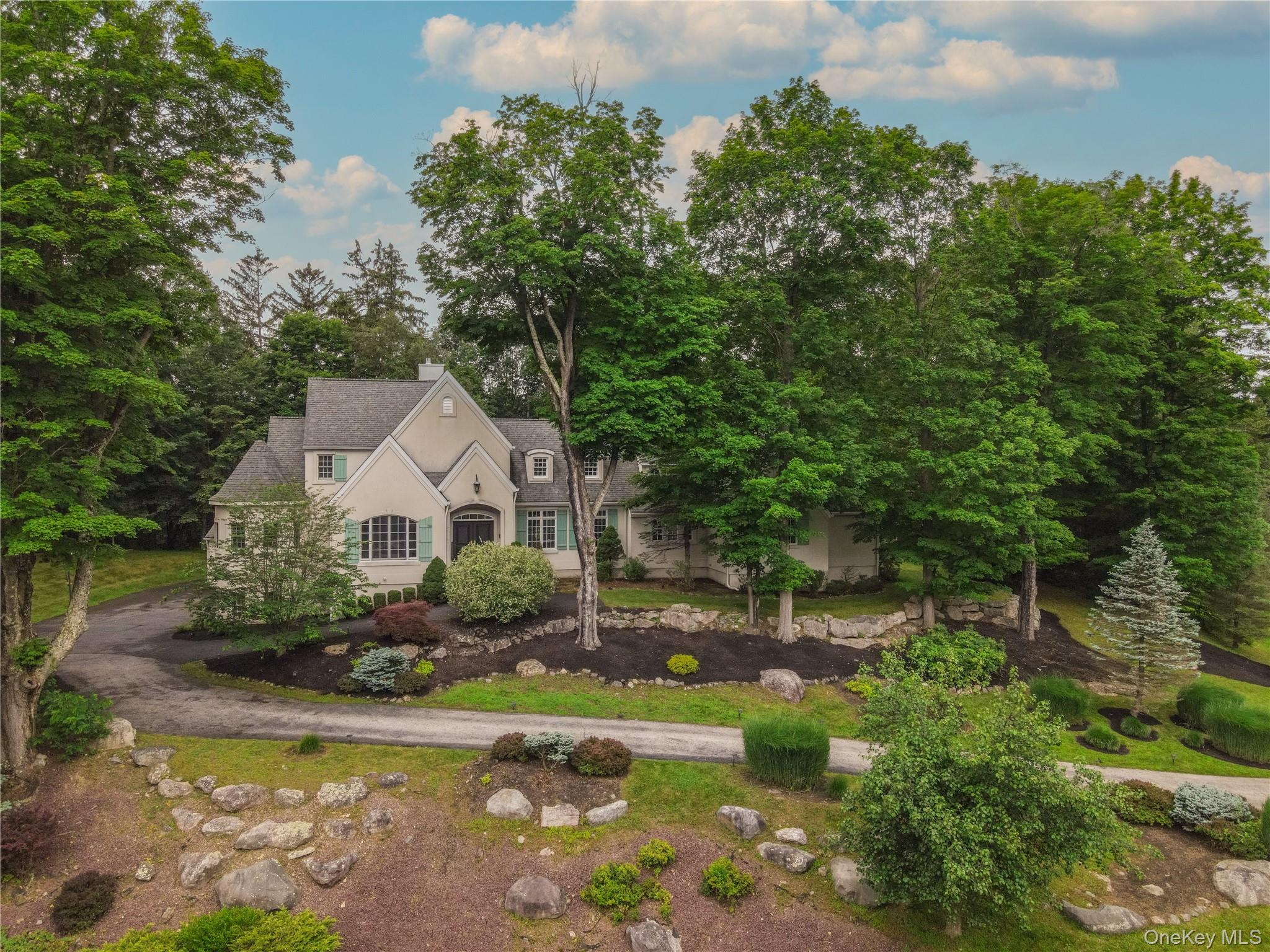 10 Greenwich Avenue Central Valley, NY 10917 - Photo 41 of 42 a front view of a house with a yard and trees