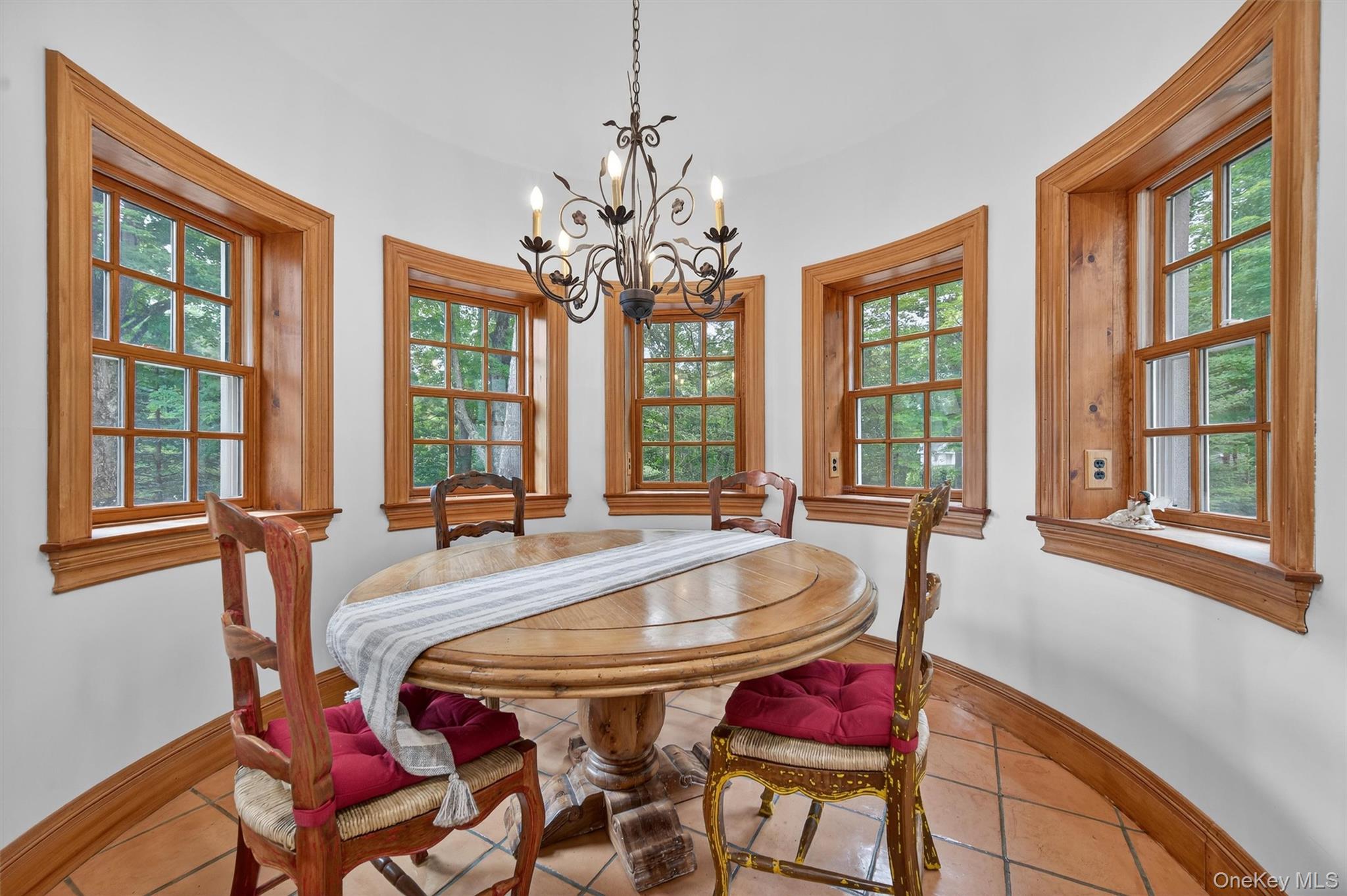 10 Greenwich Avenue Central Valley, NY 10917 - Photo 8 of 42 a dining room with chandelier and wooden floor