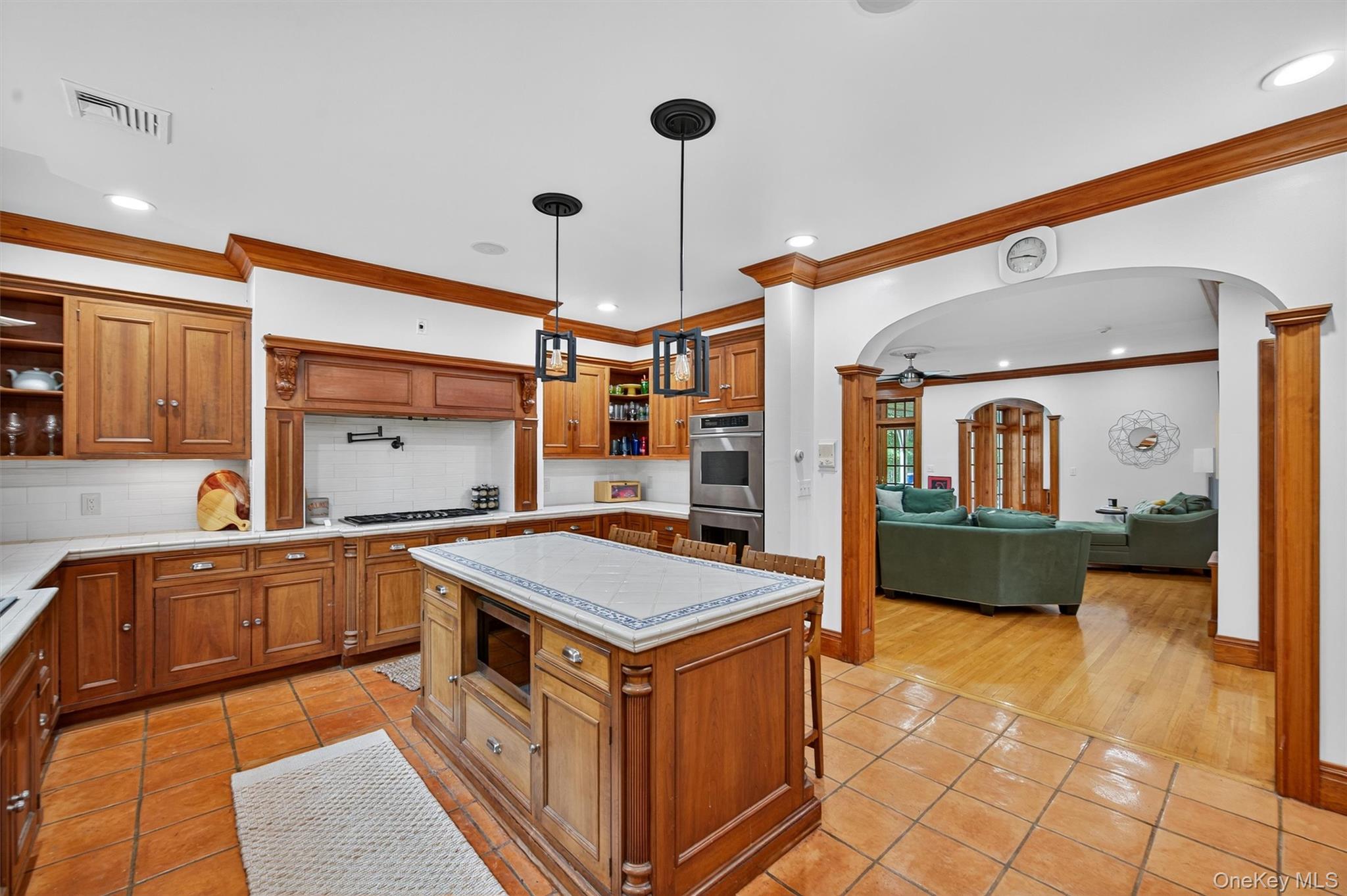 10 Greenwich Avenue Central Valley, NY 10917 - Photo 9 of 42 a kitchen with a stove a sink and a refrigerator