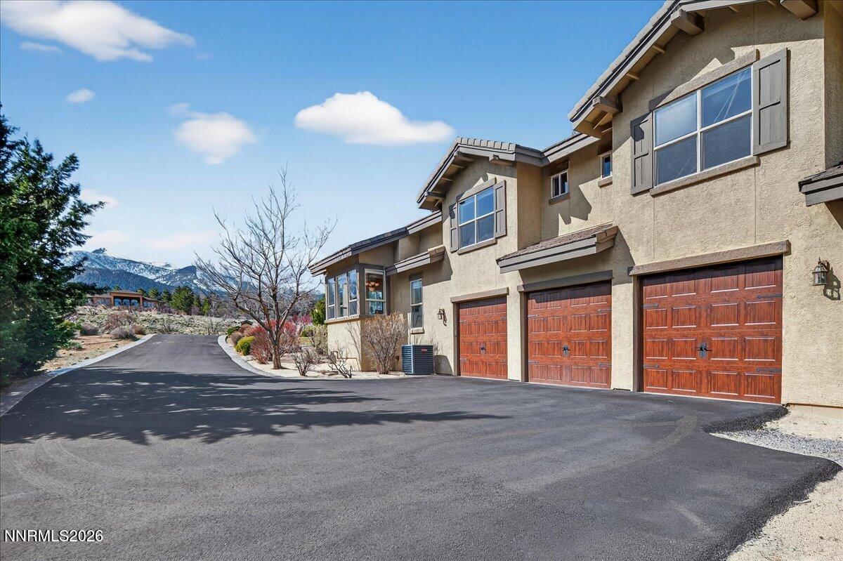 224 South Earlham Court Reno, NV 89511 - Photo 17 of 54 a view of a house with a garage